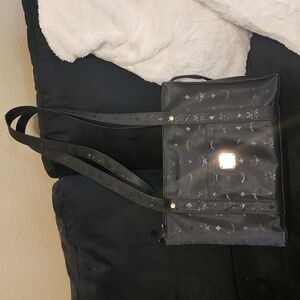 MCM Black Crossbody Messenger small tear in handle